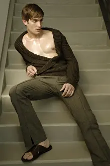 Thoughtful Prints: Young man sitting on the stairs