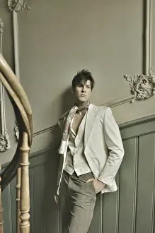 Neckerchief Prints: Young man standing in an old stairwell, nostalgia