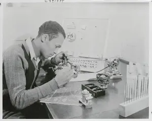 Maine Prints: Young Man Working with Technical Device