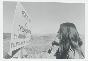 Richmond Prints: Young Native American Painting over Government Sign