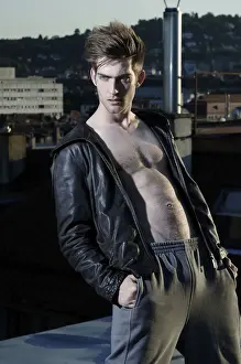 Lascivious Prints: Young rebel in cool clothes on a roof at dusk