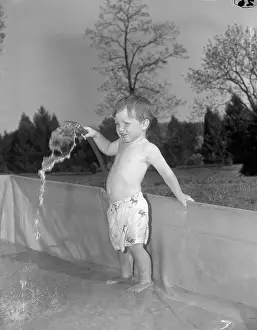 Mclean Prints: Young Robert Kennedy Jr. at Age Three Holding Water Hose