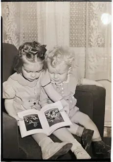Picture Book Prints: Young Sister and Brother Looking at Book