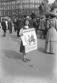 Young Suffragist Wearing Placard