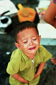 Young Vietnamese Boy Crying