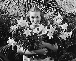 Greenhouse Prints: Young Woman with Arms Full of Easter Lillies