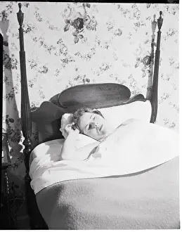 Comfortable Prints: Young Woman Lying in Bed