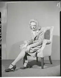 Young Woman Modeling Pair of Homemade Hosiery