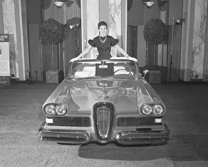 Young Woman Posing in Newly Designed Convertible