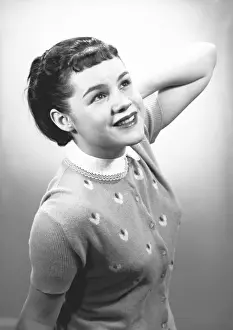 Short Sleeved Prints: Young woman posing in studio, (B&W), portrait