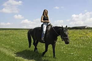 Perissodactyla Gallery: Young woman riding on horseback, Bavaria, Germany, Europe