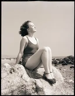 Sandals Prints: Young Woman Sitting on Beach Rocks