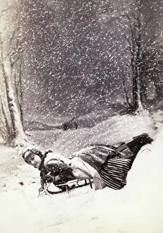 Snowfall Prints: Young Woman Snow-Sledding
