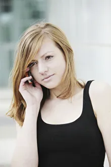 Portability Collection: Young woman speaking on her mobile phone