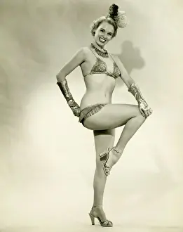 Glove Prints: Young woman standing in show girl costume, (B&W)