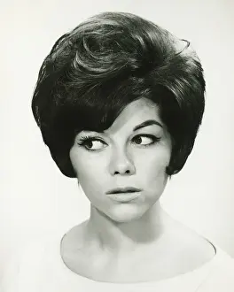 Young woman in studio, (B&W), portrait
