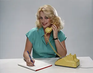 Casual Collection: Young woman talking on phone, smiling, portrait