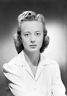 Hair Back Prints: Young woman wearing blouse, portrait