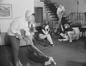 Polishing Prints: Young Women Cleaning a Room