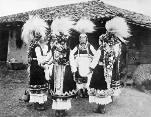Young Women Dressed in Native Costumes