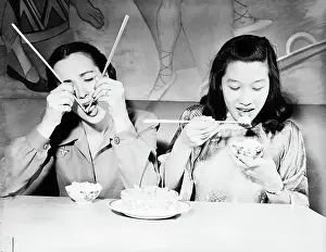 Ethnic Diversity Prints: Young Women Eating Chinese Food