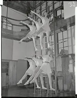 Young Women Exercising in Unison