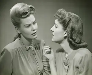 Attitude Prints: Two young women having serious discussion, (B&W)
