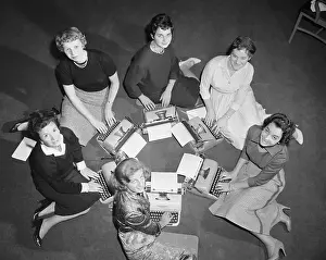 Wavy Hair Prints: Young Women Sitting on Floor with Typewriters