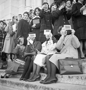 Solar Prints: Young Women Watching a Solar Eclipse