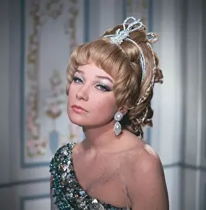 Younger Shirley MacLaine Posing in Formal Wear