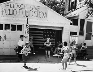 Toy Hoop Prints: Youngster Hula Hooping For Polio Victims