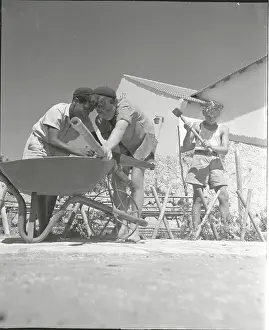 Hard Prints: Youngsters Constructing a Fence