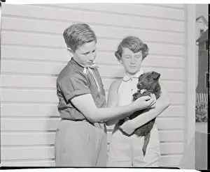Toledo Prints: Youngsters Holding Black Scottie Pup