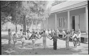 Youngsters Joining Hands During Recess Outside School