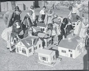Long Beach Prints: Youngsters and Lewis J. Cadieux with Doll Houses