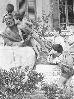 Youngsters Playing at Statue of Famous Poet Trilussa