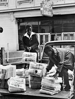 Youths Loading Trucks with Black Panther Newspapers