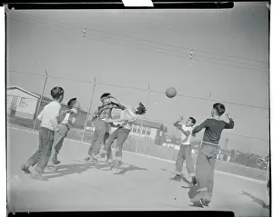 Youths Playing Basketball