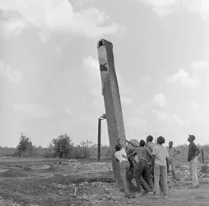Dawson Prints: Youths Pushing Over Chimney