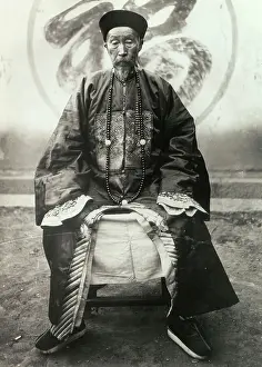 Dignity Prints: Yunnan a Type of Old Mandarin Sitting in Chair