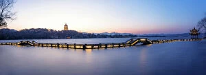 Architectural Feature Gallery: A zig zag bridge agsinst Leifeng Pagoda on the West Lake, Hangzhou