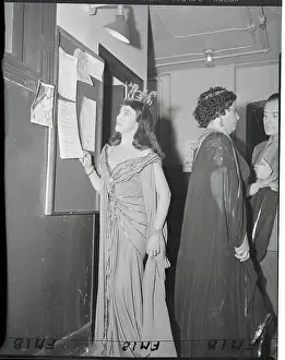 Zinka Milanov Reading a Bulletin Board