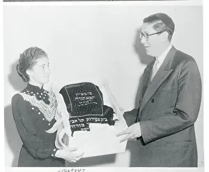 Zipporah Kronman Presenting Gifts to Theodore Lewis